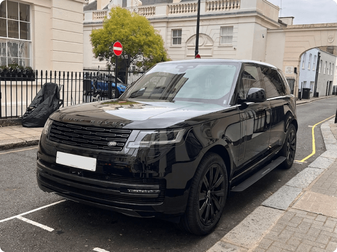Black Range Rover luxury SUV parked on a London street
