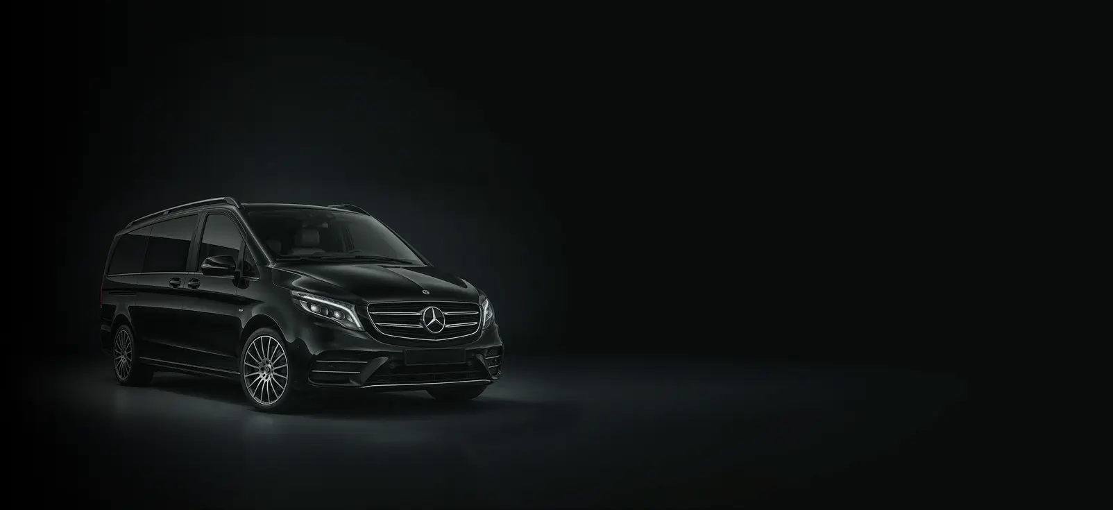 Mercedes-Benz V-Class chauffeur vehicle in a dark studio