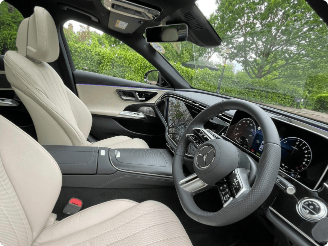 Mercedes-Benz E-Class interior with leather seats and dashboard