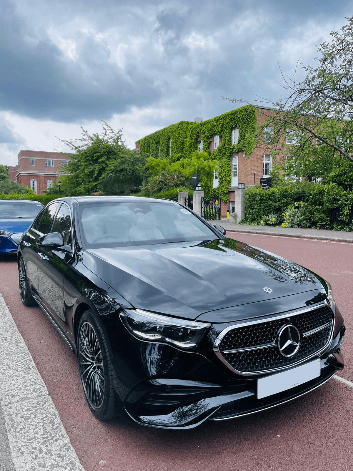 Black Mercedes-Benz E-Class viewed from the front