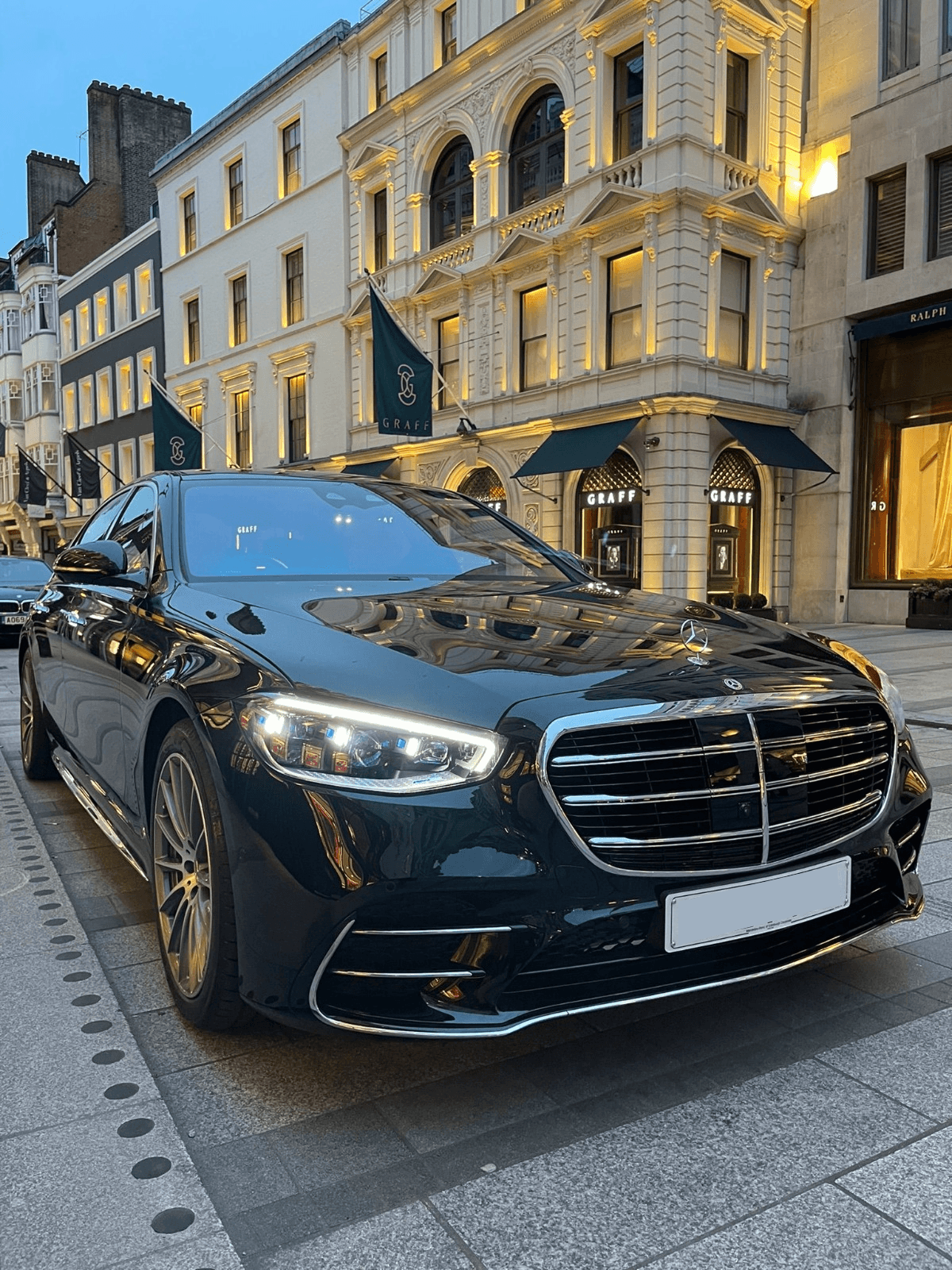 Black Mercedes-Benz S-Class parked on a London street