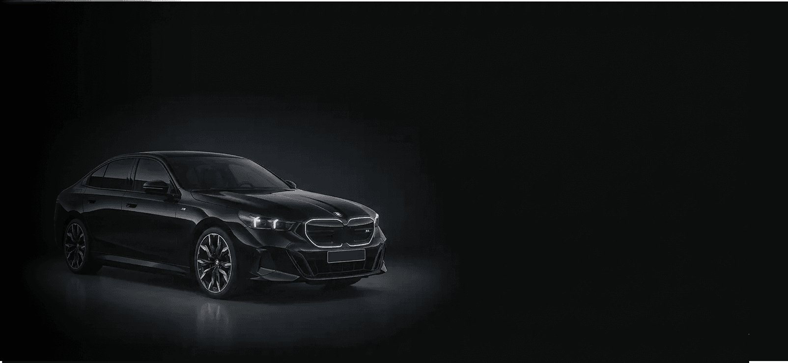 BMW 5 Series luxury saloon in a studio setting