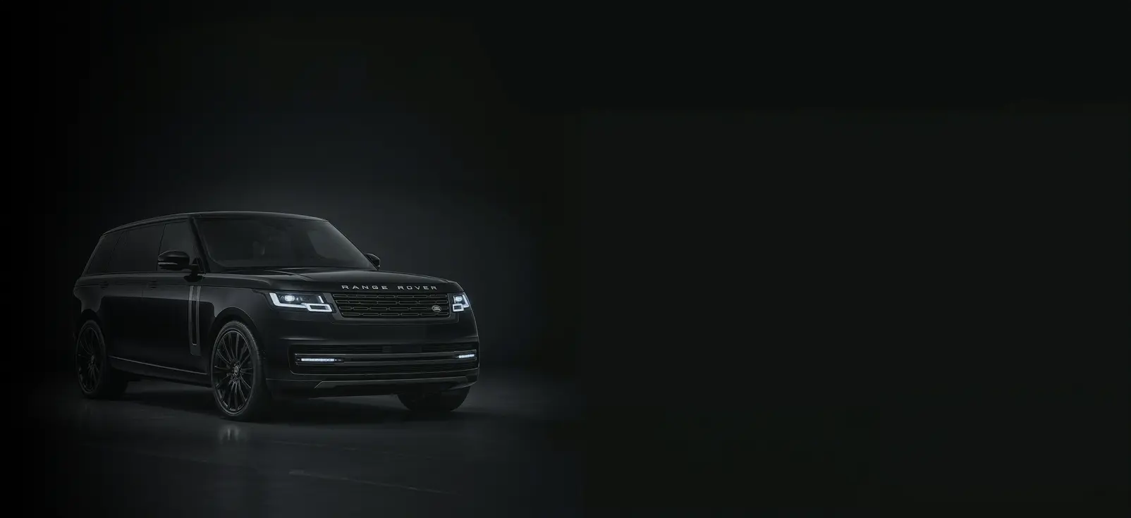 Range Rover luxury SUV shown in a studio setting