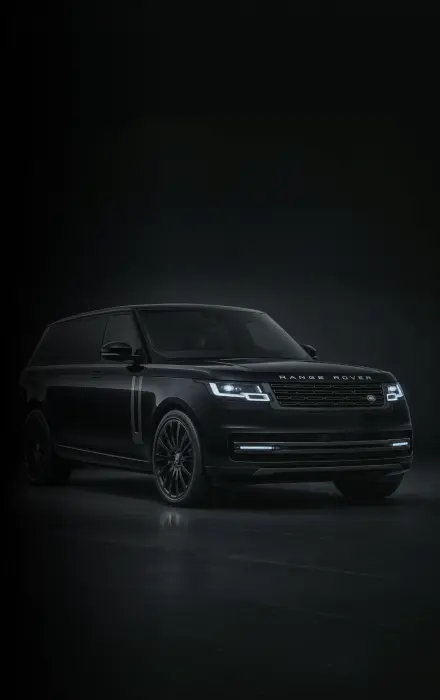 Range Rover luxury SUV in a dark studio setting