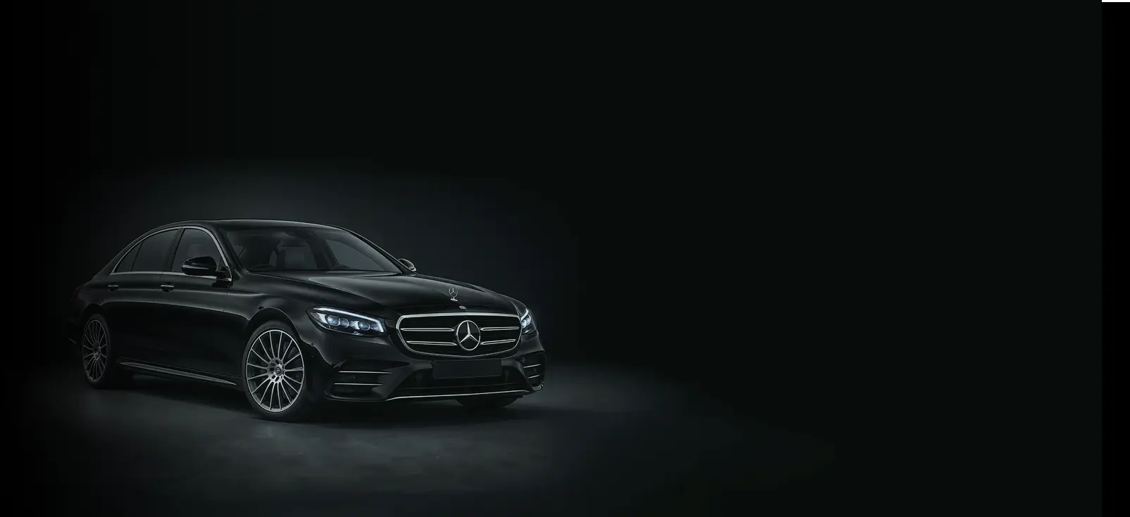 Mercedes-Benz E-Class luxury saloon in a studio setting